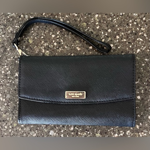 kate spade Handbags - Kate Spade Black Laurel Way Iphone Wristlet Wallet | Leather Passport Travel